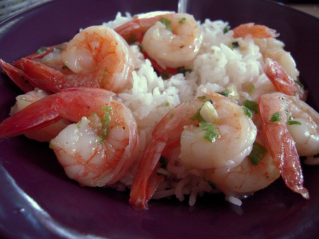 Baked shrimp served over rice